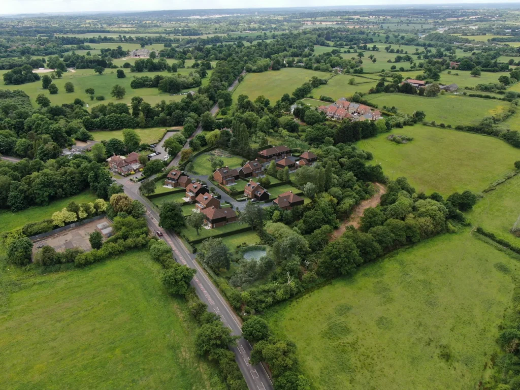 aerial drone property cgi former garden centre context view